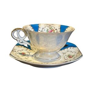 Elegant Floral Teacup and Saucer Set